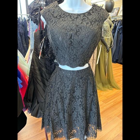 Hannah S Dresses & Skirts - Two piece black lace short dress. Dress is brand new with tags attached size 4.